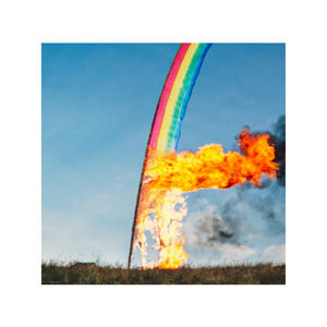 Cover art of Sigur Rós' ÁTTA.
It depicts a large rainbow beach flag that is on fire.
The fire was started from the bottom.
