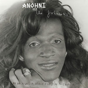 Cover art of ANOHNI and the Johnsons' My Back Was a Bridge for You to Cross.
It's a portrait of Marsha P. Johnson.
Marsha is looking into the camera, and is wearing earrings and a ring on her ring finger.
The band name is written (stylized) at the top, the album name is written at the bottom.