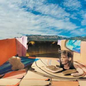 Cover art of Jenny Hval's Classic Objects.
In the foreground are a picture of Jenny and some rocks, surrounded by some cardboard.
In the background are mountains and a lightly clouded sky.