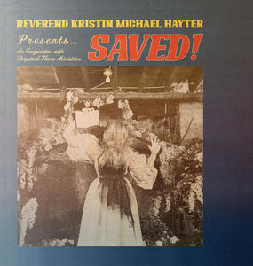 Cover art of Reverend Kristin Michael Hayter's SAVED!.
On the cover there is a black and white picture of a woman in a white, stained dress.
She is holding up a book in a preacher-like way.