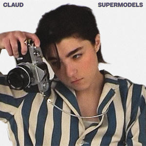 Claud - Supermodels Cover art of Claud's Supermodels.
It shows Claud in a blue and white striped shirt.
They are looking through the lens of an old camera.