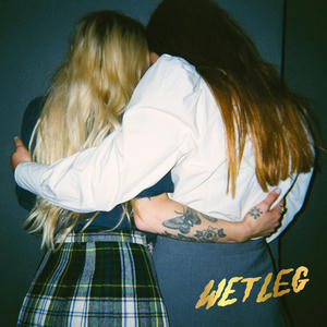 Cover art of Wet Leg's self-titled debut album.
It depicts two women with their backs to the camera.
The women each have one arm around the other woman.
